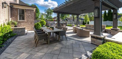 Casual Elegant Backyard Patio with Boarders and Pillars under Gazebo