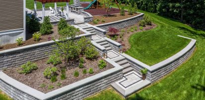 Multi-Level Retaining Wall with Plant Beds and Steps to Top Patio