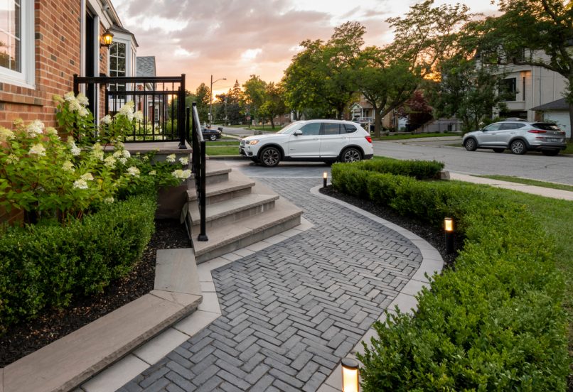 Side Walkway to Front Entrance and Driveway with Boarders