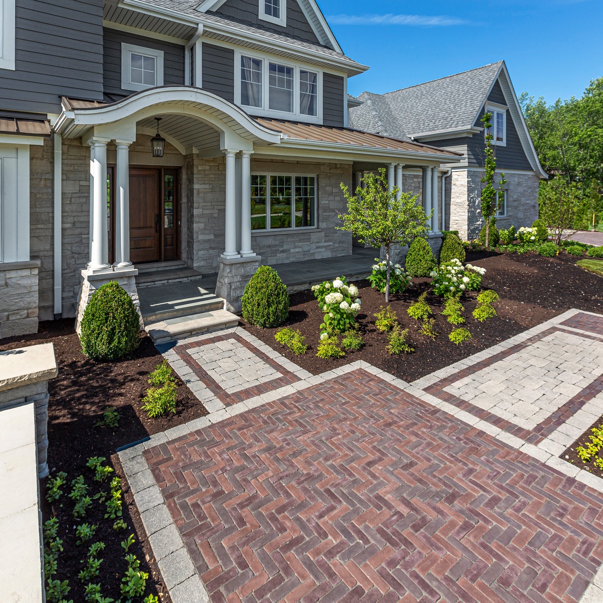 Walkway pavers leading to front entrance of home.