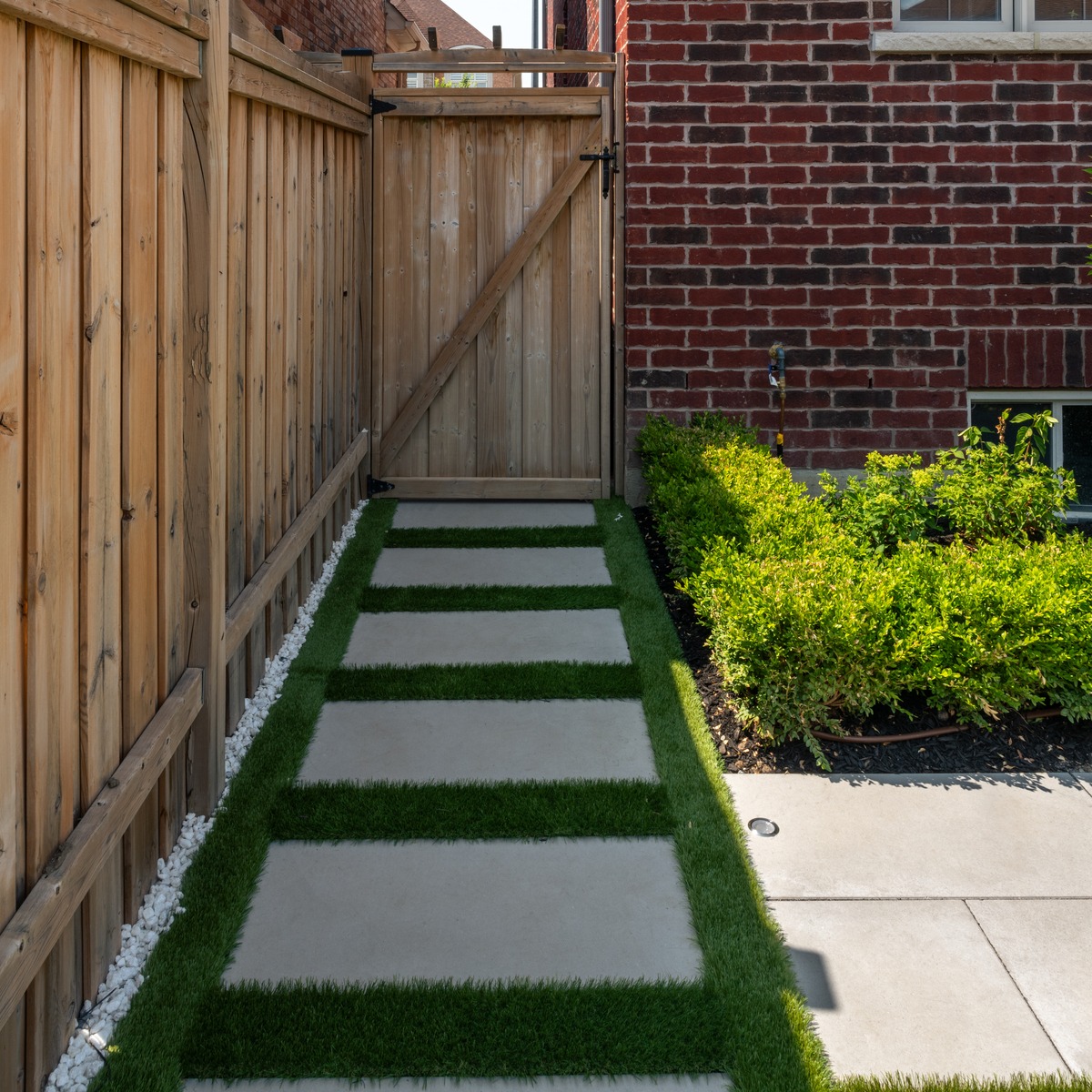 Large concrete slabs with artificial turf